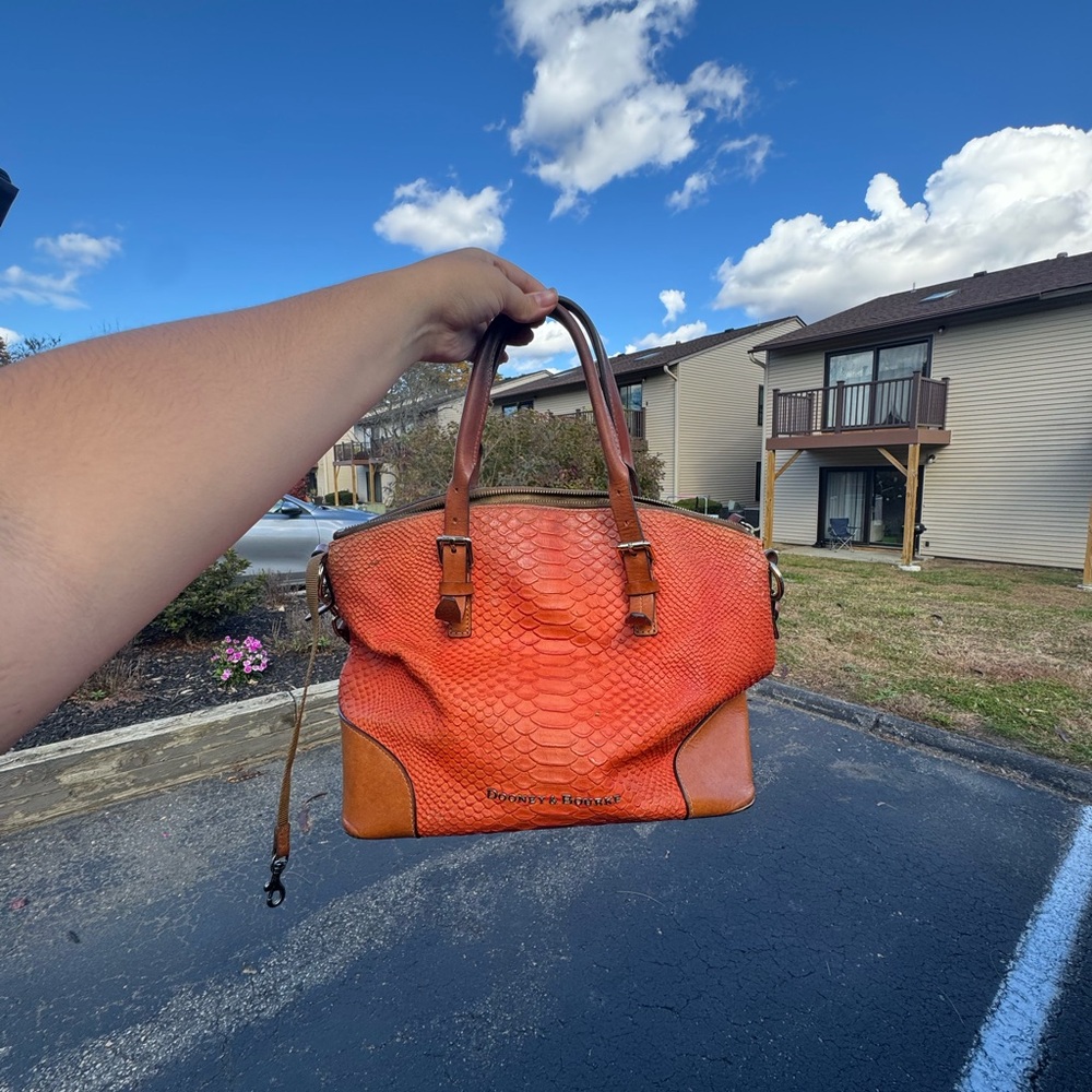 Classic Dooney & Bourke domed satchel snake peach handbag